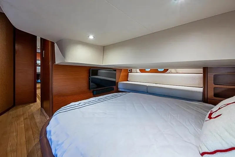 Slide: The Image of Luxurious cabin interior of 2014 Zeelander Z44 yacht with cozy bed and modern decor. - 13