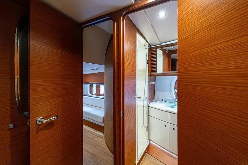 Slide: The Image of Luxurious interior of 2014 Zeelander Z44 yacht featuring wood paneling and modern bathroom. - 14