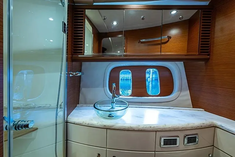 Slide: The Image of Luxurious bathroom interior of 2014 Zeelander Z44 yacht with glass sink and wooden accents. - 15
