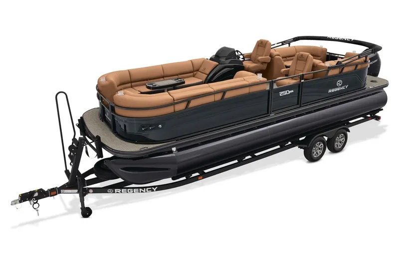 Slide: The Image of 2026 Regency 230 DL boat cockpit with tan seating and modern steering console. - 6