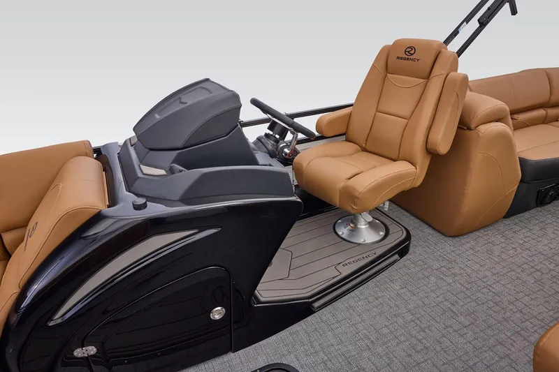 Slide: The Image of Luxurious 2026 Regency 230 DL boat interior with plush tan seating and sleek controls. - 24