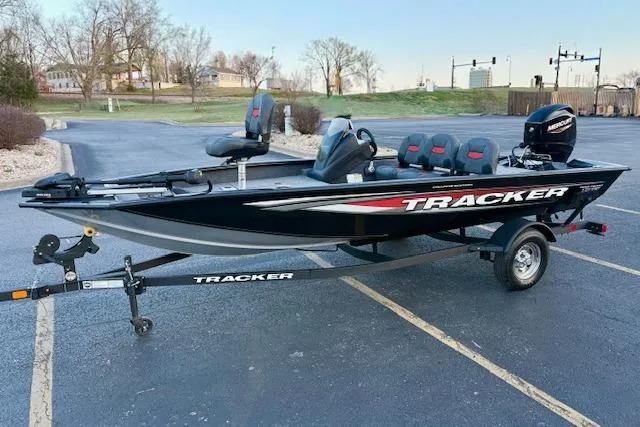 Slide: The Image of 2026 Tracker Pro Team 175 Crappie Edition boat on trailer in parking lot. - 79