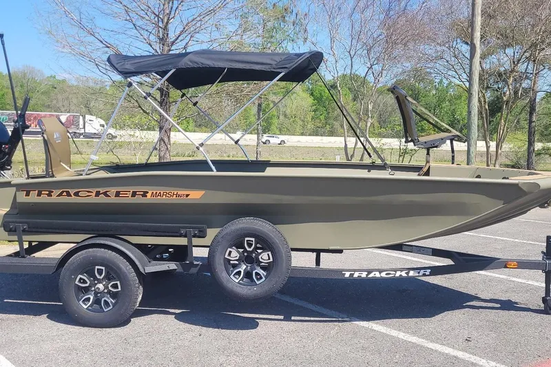 The Image of 2026 Tracker Grizzly 1756 T Marsh boat on trailer in parking lot. - 0