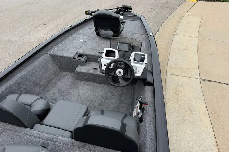 Slide: The Image of 2026 Tracker Pro Team 175 boat interior with steering wheel and control panels. - 17