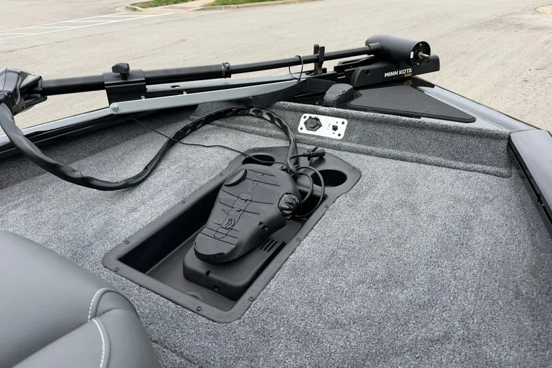 Slide: The Image of 2026 Tracker Pro Team 175 boat deck with Minn Kota trolling motor. - 19