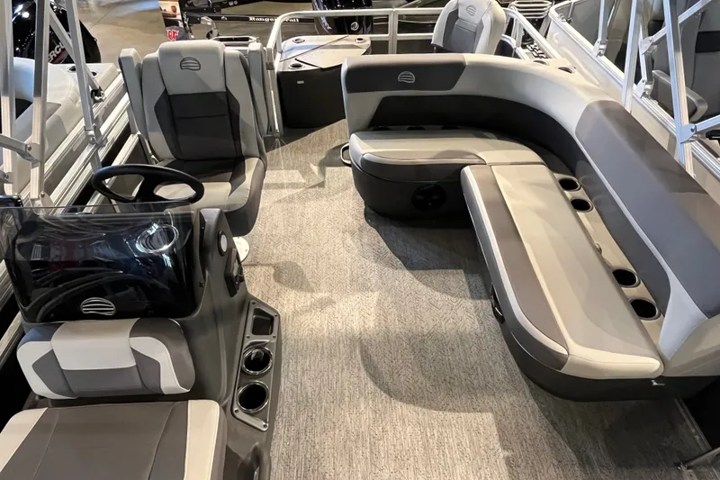 Slide: The Image of Interior of 2026 Sun Tracker Bass Buggy 18 DLX pontoon boat with seating and steering console. - 89