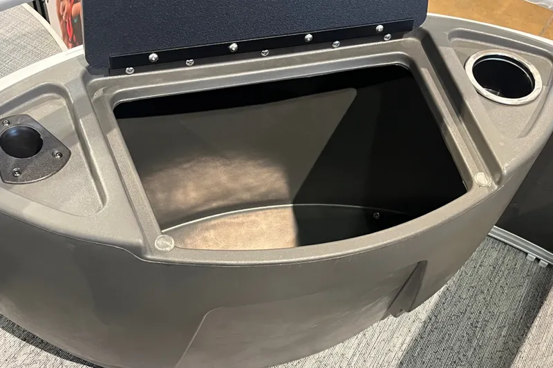 Slide: The Image of Storage compartment of 2026 Sun Tracker Bass Buggy 18 DLX pontoon boat. - 30