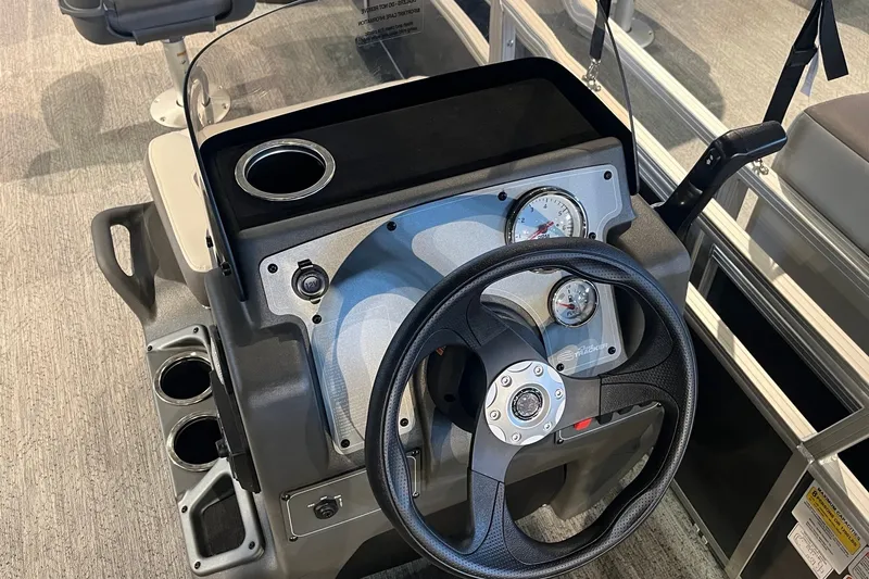 Slide: The Image of Steering console of 2026 Sun Tracker Bass Buggy 18 DLX pontoon boat. - 21