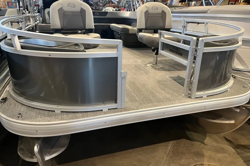 The Image of 2026 Sun Tracker Bass Buggy 18 DLX pontoon boat with seating and railing. - 0