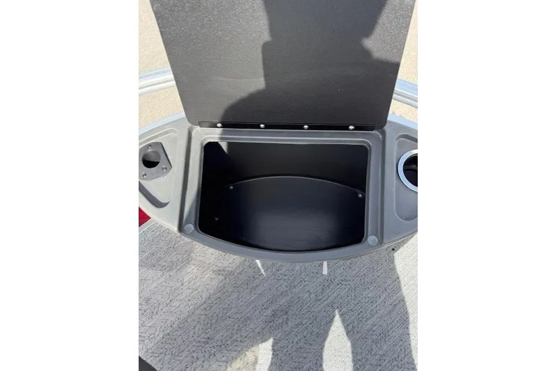 Slide: The Image of Open storage compartment on 2026 Sun Tracker Bass Buggy 18 DLX boat. - 11