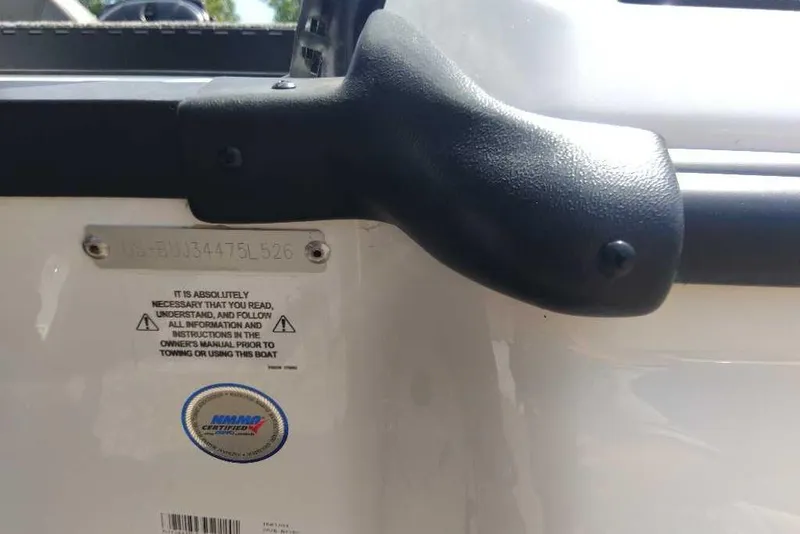 Slide: The Image of 2026 Nitro Z17 boat detail with safety instructions and certification label. - 6
