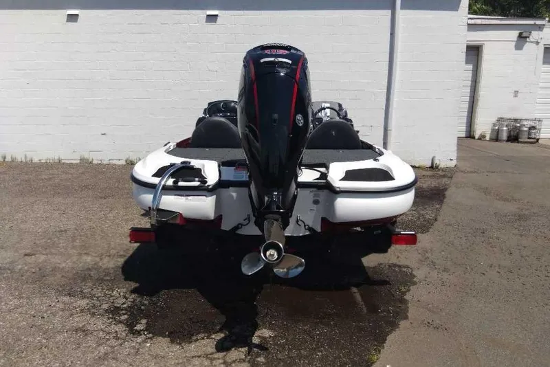 Slide: The Image of 2026 Nitro Z17 boat rear view with powerful outboard motor. - 2