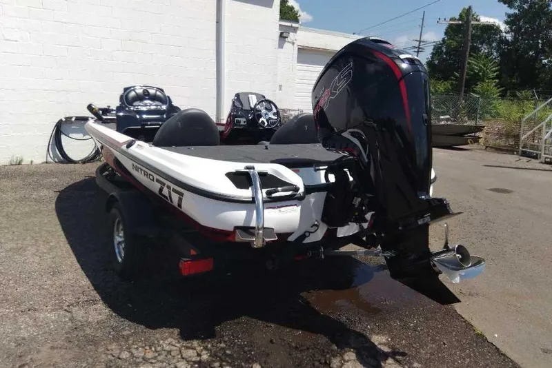 Slide: The Image of 2026 Nitro Z17 boat with powerful outboard motor in outdoor setting. - 1