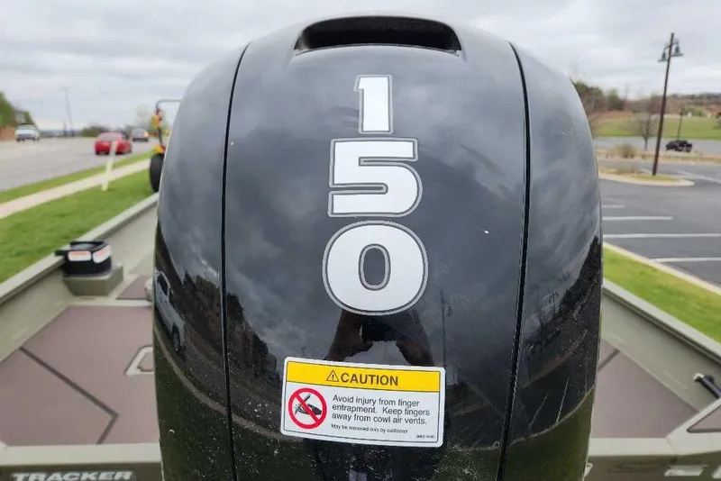 Slide: The Image of Outboard motor on 2026 Tracker Grizzly 2072 CC boat, featuring a 150 horsepower engine. - 53