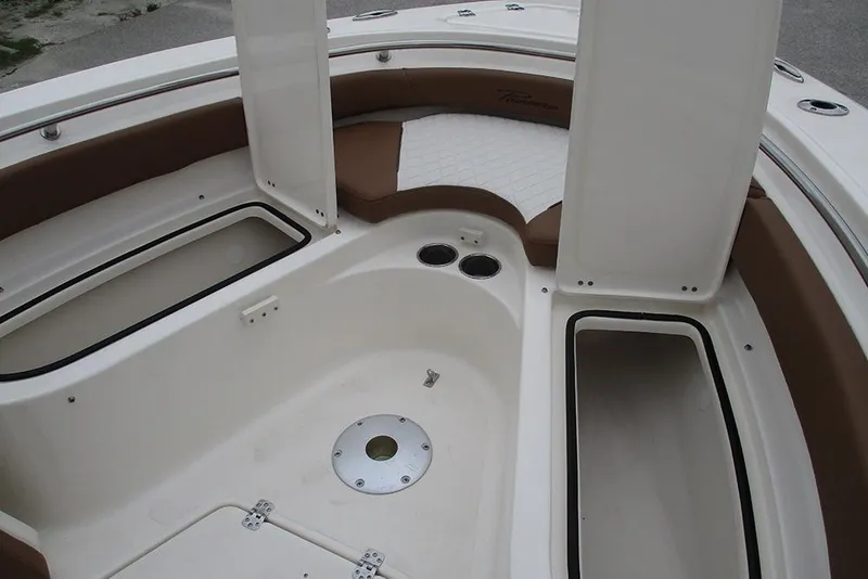 Slide: The Image of Interior view of 2025 Pioneer 222 Islander boat with storage compartments. - 16