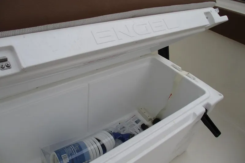 Slide: The Image of Open Engel cooler on Pioneer 222 Islander boat, 2025 model, with items inside. - 20