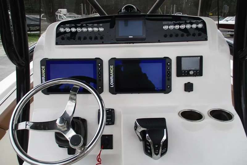 Slide: The Image of Dashboard of 2025 Pioneer 222 Islander boat with navigation screens and controls. - 31