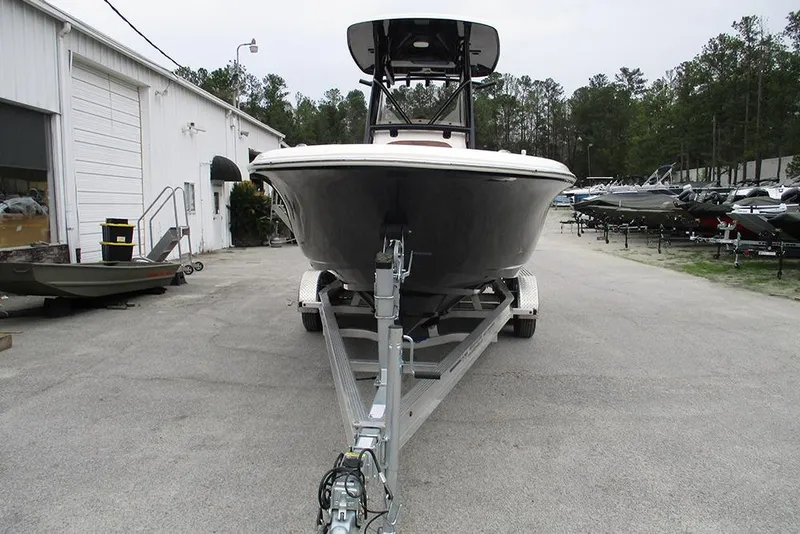 Slide: The Image of 2025 Pioneer 222 Islander boat on trailer at dealership lot. - 5