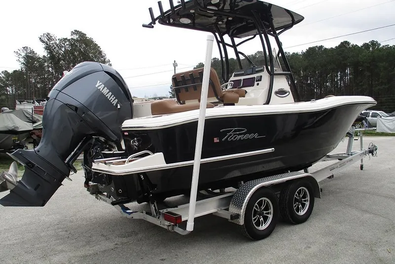 Slide: The Image of 2025 Pioneer 222 Islander boat on trailer with Yamaha outboard motor. - 8