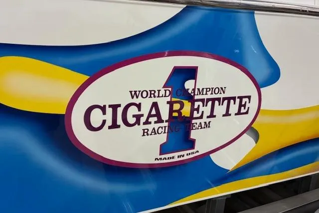 Slide: The Image of 1984 Cigarette 35' Cafe Racer with "World Champion Racing Team" logo. - 5