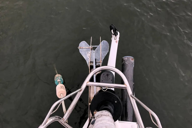 Slide: The Image of Top view of a 2004 J Boats J/133 yacht's stern with anchor and railing. - 26