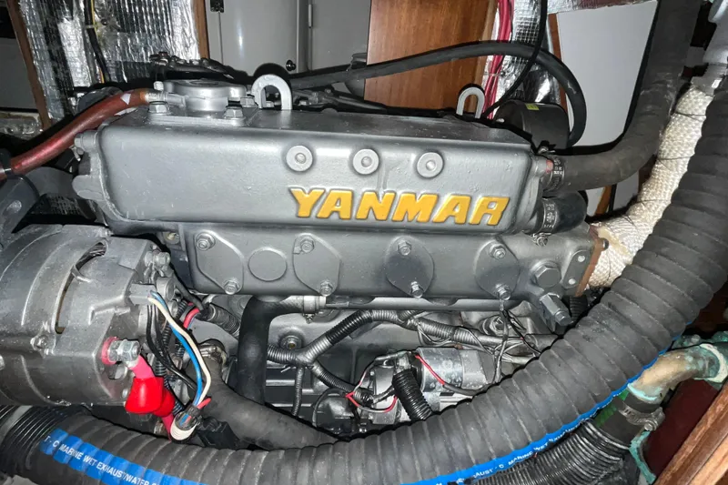 Slide: The Image of Yanmar engine in a 2004 J Boats J/133 sailboat, showcasing mechanical components. - 28