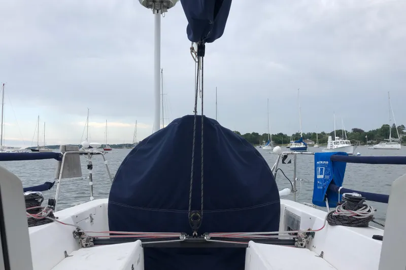 Slide: The Image of Cockpit view of a 2004 J Boats J/133 sailboat in a marina. - 4