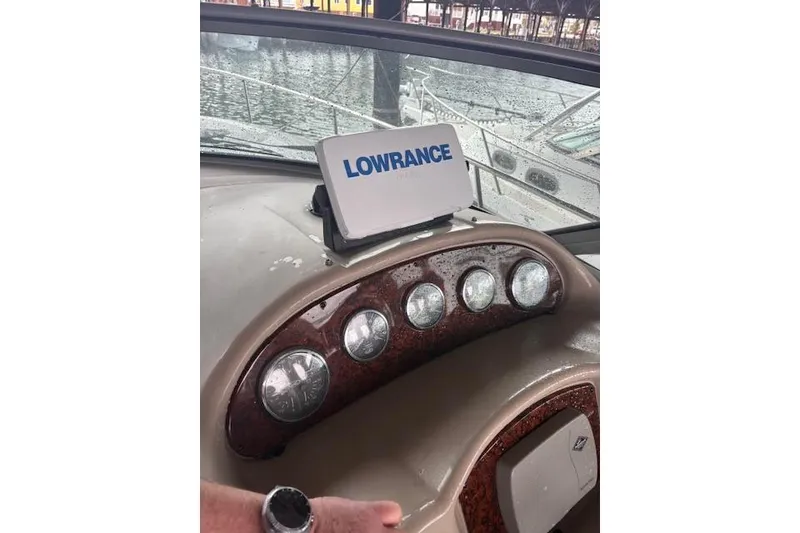 Slide: The Image of Dashboard of a 2005 Sea Ray Sundancer 320 with Lowrance navigation system. - 18