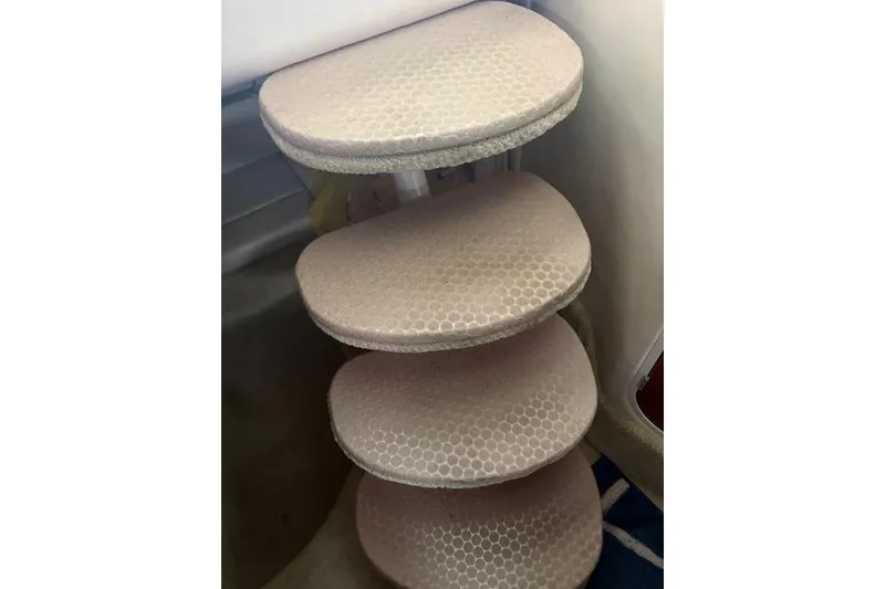 Slide: The Image of Carpeted steps inside a 2005 Sea Ray Sundancer 320 boat. - 28