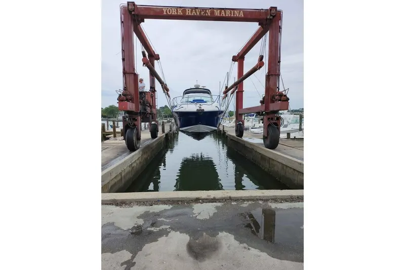 Slide: The Image of 2005 Sea Ray Sundancer 320 being lifted at York Haven Marina. - 3