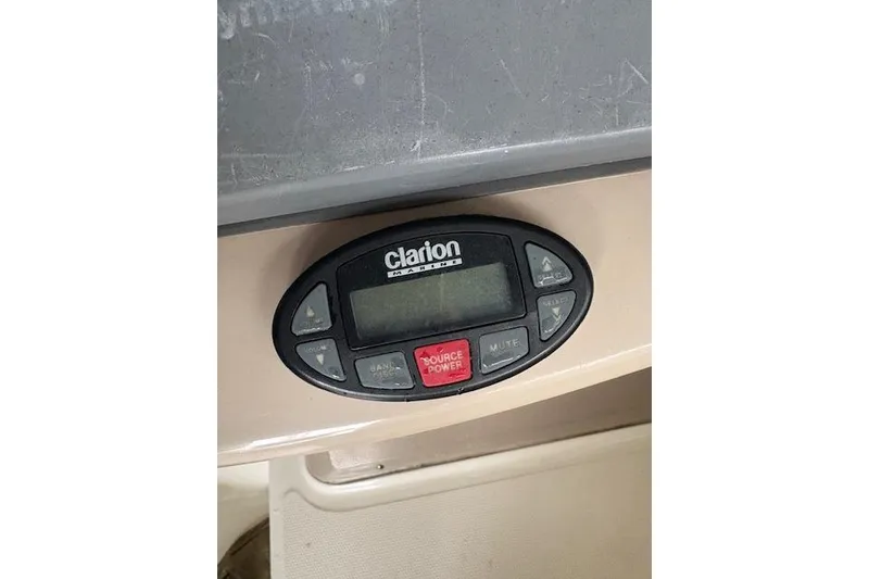 Slide: The Image of Clarion marine audio system on 2005 Sea Ray Sundancer 320 boat dashboard. - 35