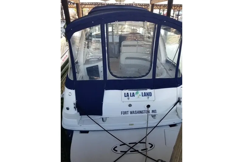 Slide: The Image of 2005 Sea Ray Sundancer 320 docked in Fort Washington, MD, with blue canopy. - 6