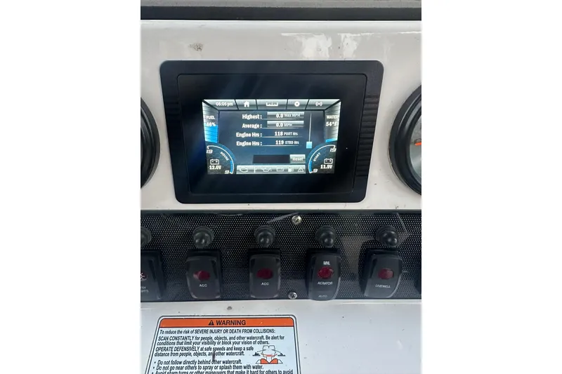 Slide: The Image of Dashboard of 2019 Yamaha Boats 210 FSH Sport with digital display and controls. - 20