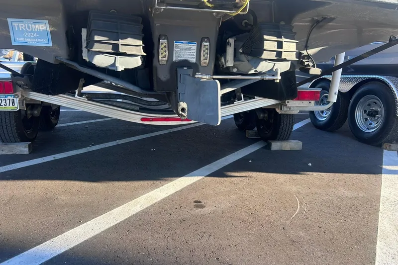 Slide: The Image of 2019 Yamaha Boats 210 FSH Sport on trailer, parking lot view. - 6