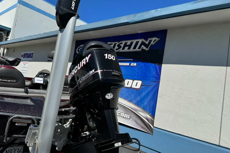 Slide: The Image of 2010 Ranger 178 VS boat with Mercury OptiMax 150 engine outside a dealership. - 10