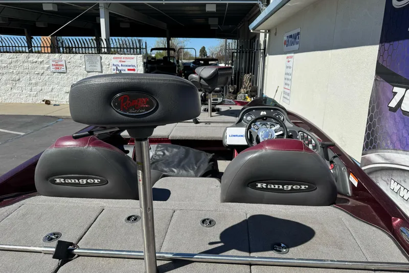 Slide: The Image of 2010 Ranger 178 VS boat interior with branded seats and steering console. - 12