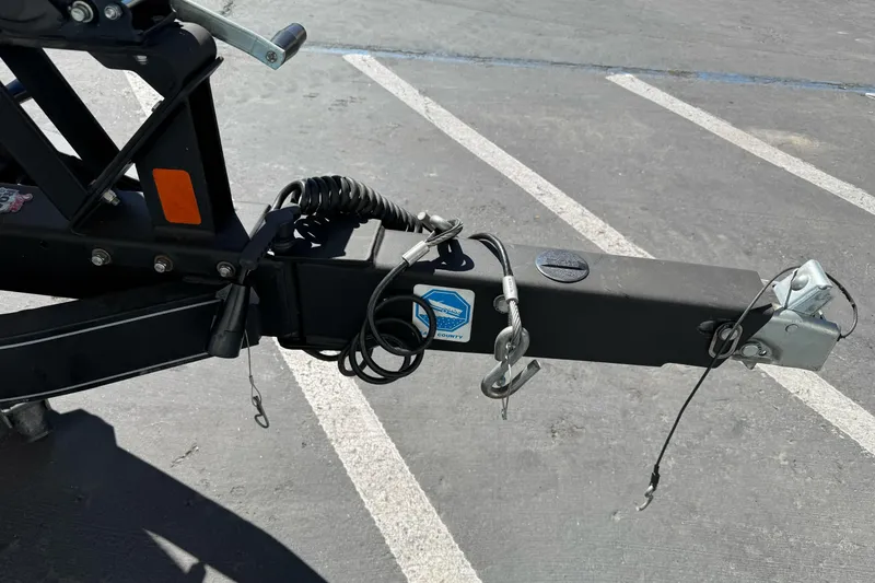 Slide: The Image of Trailer hitch of a 2010 Ranger 178 VS boat in a parking lot. - 4