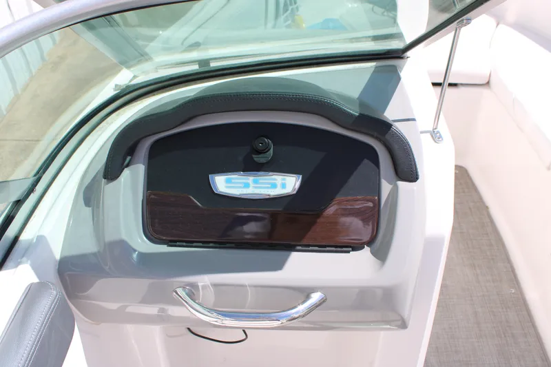 Slide: The Image of 2021 Chaparral 19 SSi Ski & Fish dashboard with SSI logo and sleek design. - 11