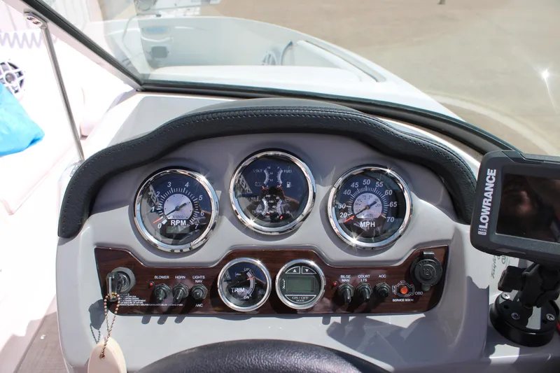 Slide: The Image of Dashboard of 2021 Chaparral 19 SSi Ski & Fish boat with gauges and controls. - 12