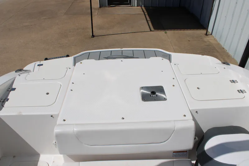 Slide: The Image of 2021 Chaparral 19 SSi Ski & Fish boat deck with storage compartments. - 13