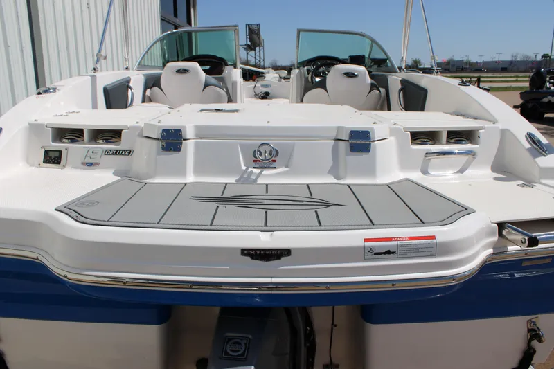 Slide: The Image of 2021 Chaparral 19 SSi Ski & Fish boat, rear view with seating and deck. - 18