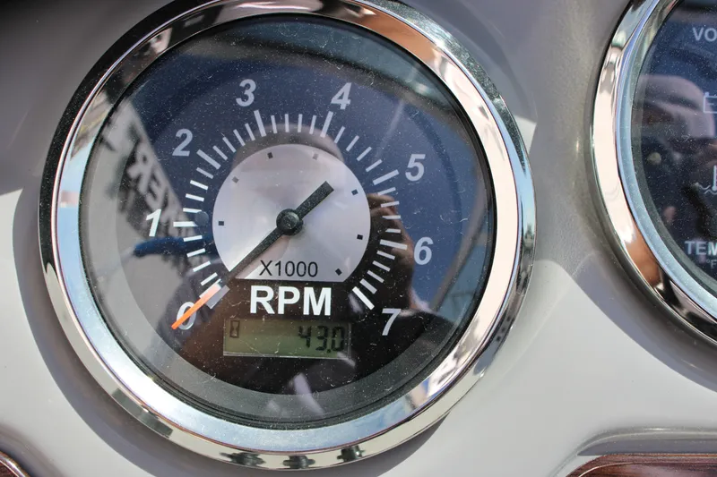 Slide: The Image of Close-up of 2021 Chaparral 19 SSi Ski & Fish RPM gauge displaying 4300 RPM. - 8