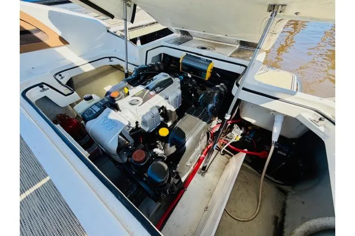 Slide: The Image of Engine compartment of a 2017 Cobalt R7 boat, showcasing detailed mechanical components. - 27