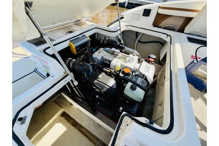 Slide: The Image of Engine compartment of a 2017 Cobalt R7 boat, showcasing detailed mechanical components. - 28