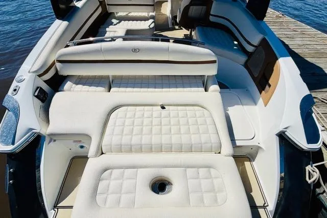 Slide: The Image of Luxurious 2017 Cobalt R7 boat interior with plush white seating and elegant design. - 9