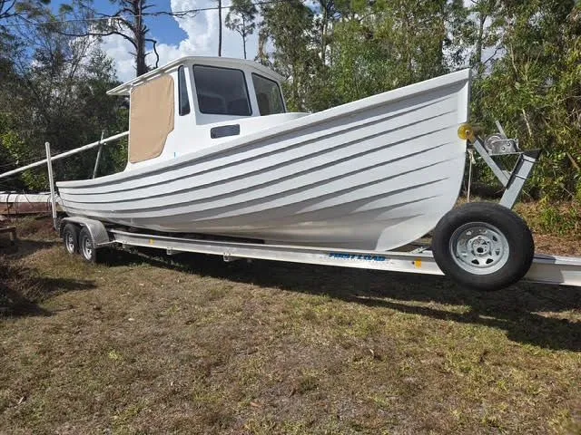Slide: The Image of White 2021 Porter Lobster Boat on trailer parked outdoors. - 1