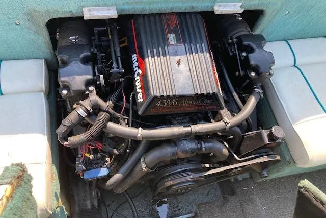 Slide: The Image of 1990 Searay 200 Cuddy boat engine, 4.3 V6 MerCruiser Alpha One. - 4