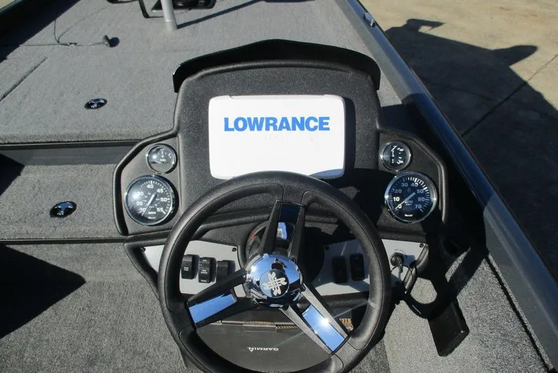 Slide: The Image of 2023 Ranger RT178 boat dashboard with Lowrance display and steering wheel. - 7