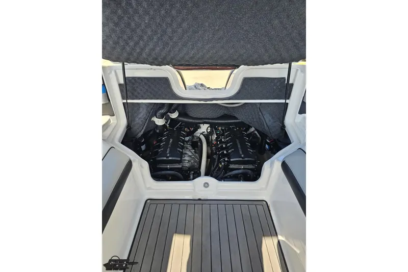 Slide: The Image of 2017 Yamaha Boats 242X E-Series engine compartment with dual engines visible. - 110