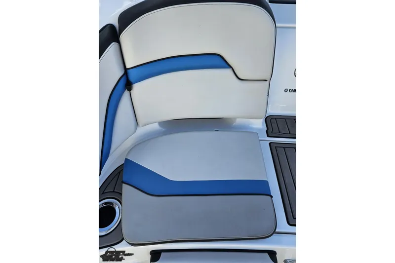 Slide: The Image of 2017 Yamaha Boats 242X E-Series seat with blue and white upholstery. - 40